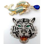 A Parcel of Two Stone Set Brooches; Comprising: 1) A Clear and Emerald Green Stone Set Tiger Head