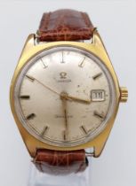 A Vintage Omega Geneve. Brown crocodile strap. Gilded case - 35mm. Gold tone dial with date window