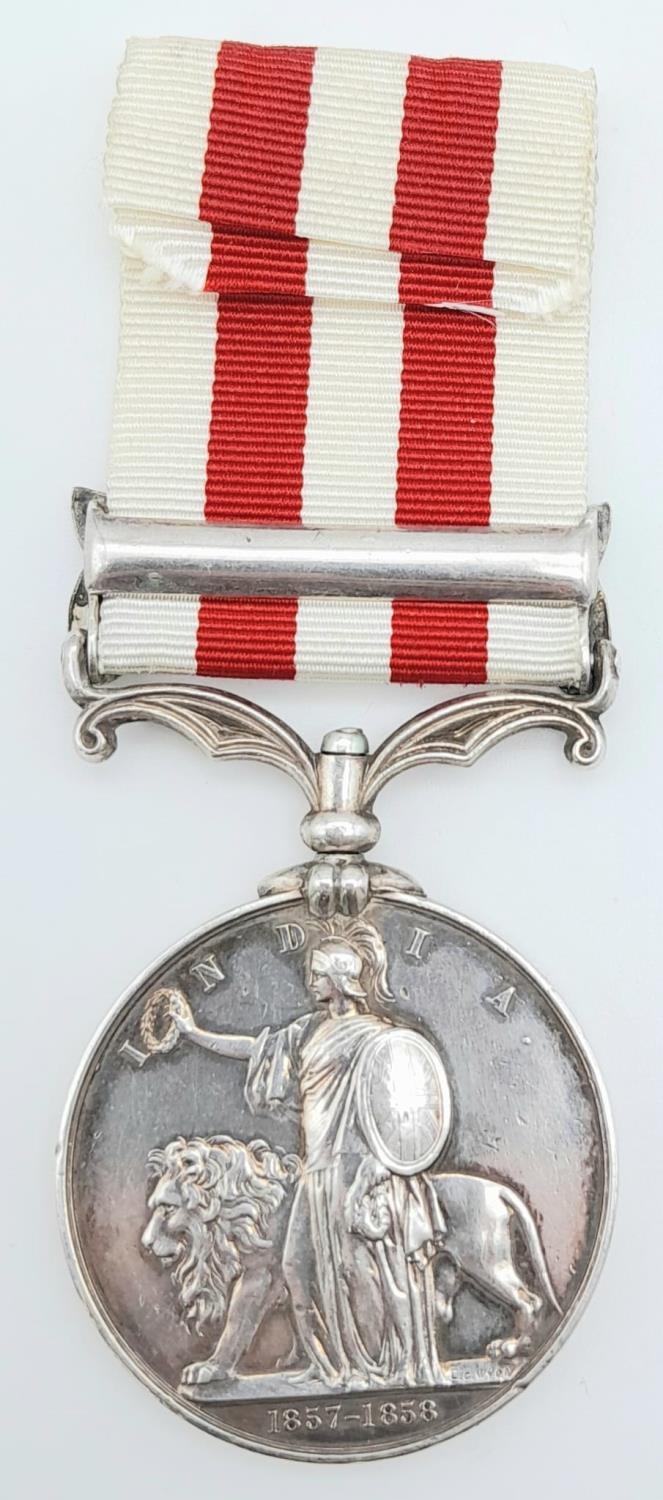 An Indian Mutiny Medal 1857-1858, with clasp ‘DELHI’; named to John Brown 1st Bn 8th Regt (renamed - Image 3 of 5