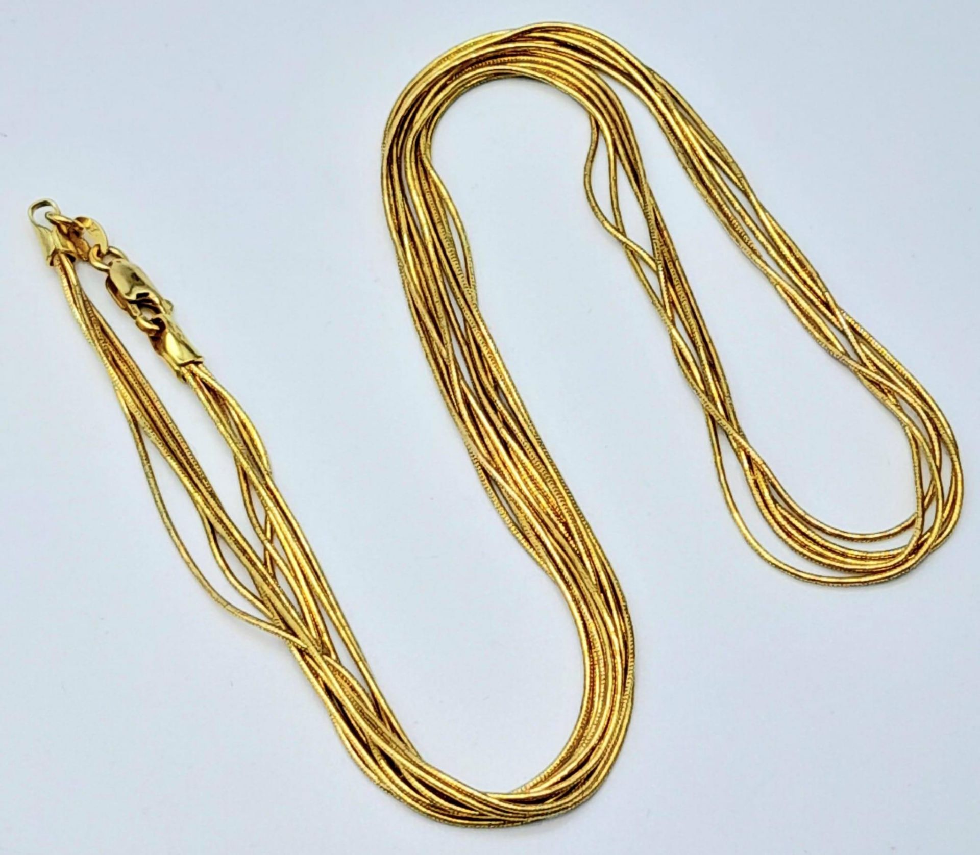 A very feminine, 9 K yellow gold, four chain necklace. length: 43 cm, weight: 9 g. - Bild 4 aus 6