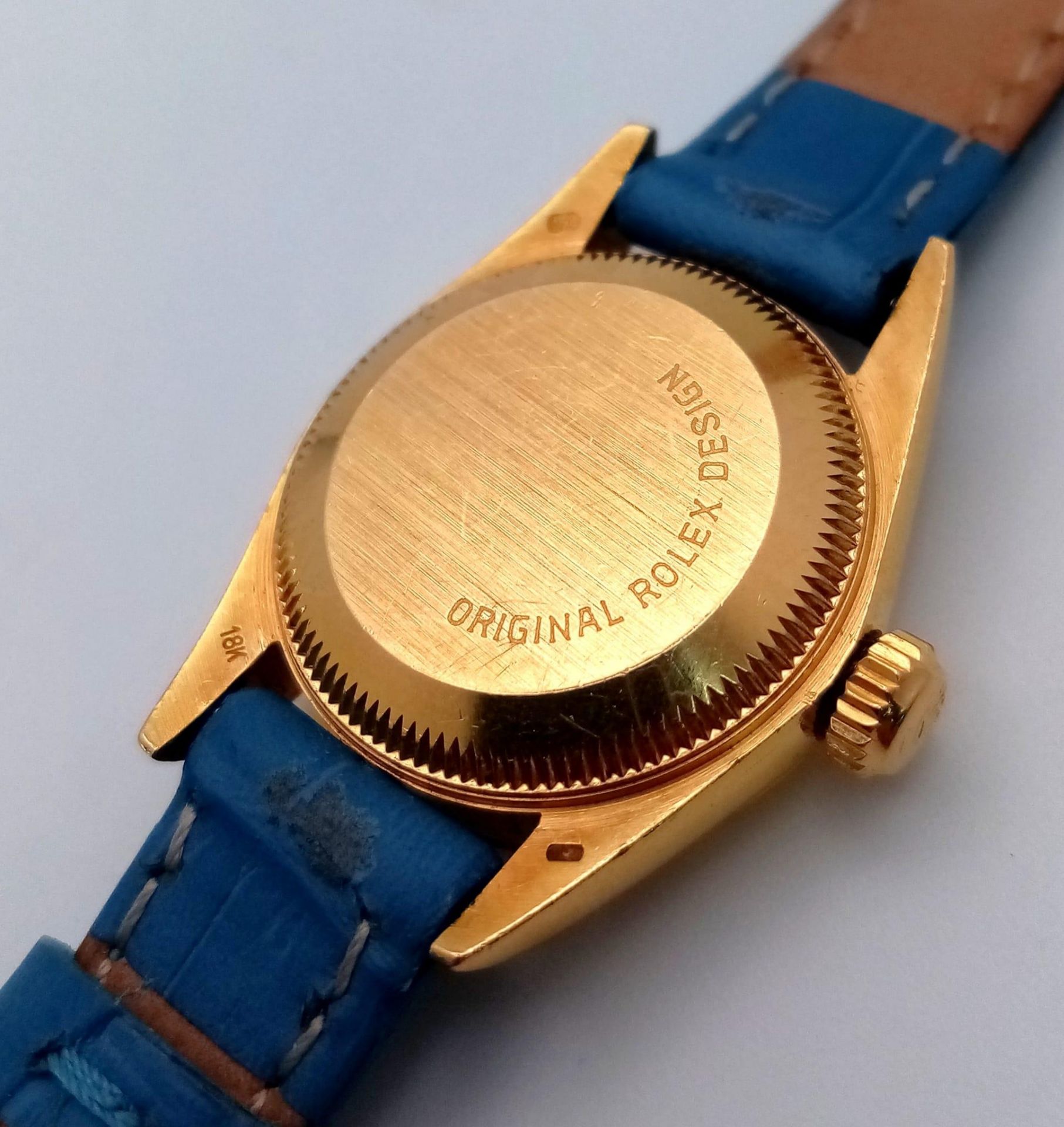 An 18k Gold Rolex Oyster Perpetual Ladies Watch. Blue leather strap. 18k gold case - 25mm. Gold tone - Image 6 of 10