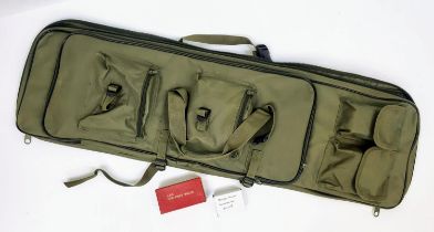 A Parcel of Shooting Accessories, Comprising: 1) An Unused, Multi-Utility Canvas Back Pack Rifle