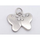 A STERLING SILVER STONE SET BUTTERFLY PENDANT. 5G