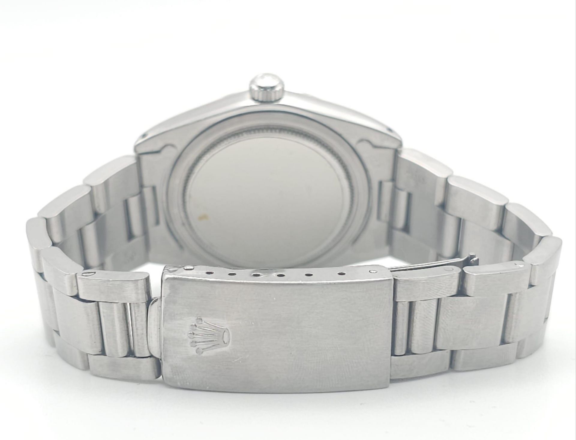 A ROLEX OYSTERDATE IN STAINLESS STEEL SPORTING THE EAGLE LOGO OF ABU DHABI .(DIAL NEEDS CLEANING) - Image 7 of 13