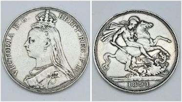 An 1891 Queen Victoria Silver Crown. VF grade but please see photos.