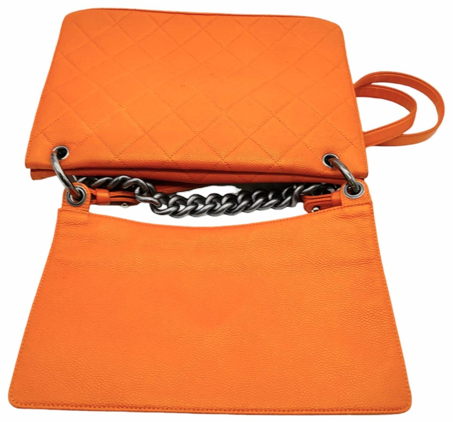A Chanel Quilted Orange Caviar Leather Shoulder Bag. Quilted pattern exterior with gunmetal - Image 6 of 13