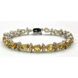 A Citrine Tennis Bracelet set in 925 Sterling silver. 27ctw. W-21.6g. 18cm. Ref: VO-83