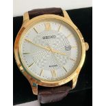 Gentlemans SEIKO QUARTZ WRISTWATCH Model GN42 01K8. Finished in gold tone with sweeping second