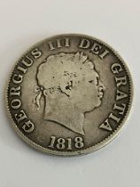 1818 GEORGE III SILVER HALF CROWN in very fine condition. Having clear detail and wording to both