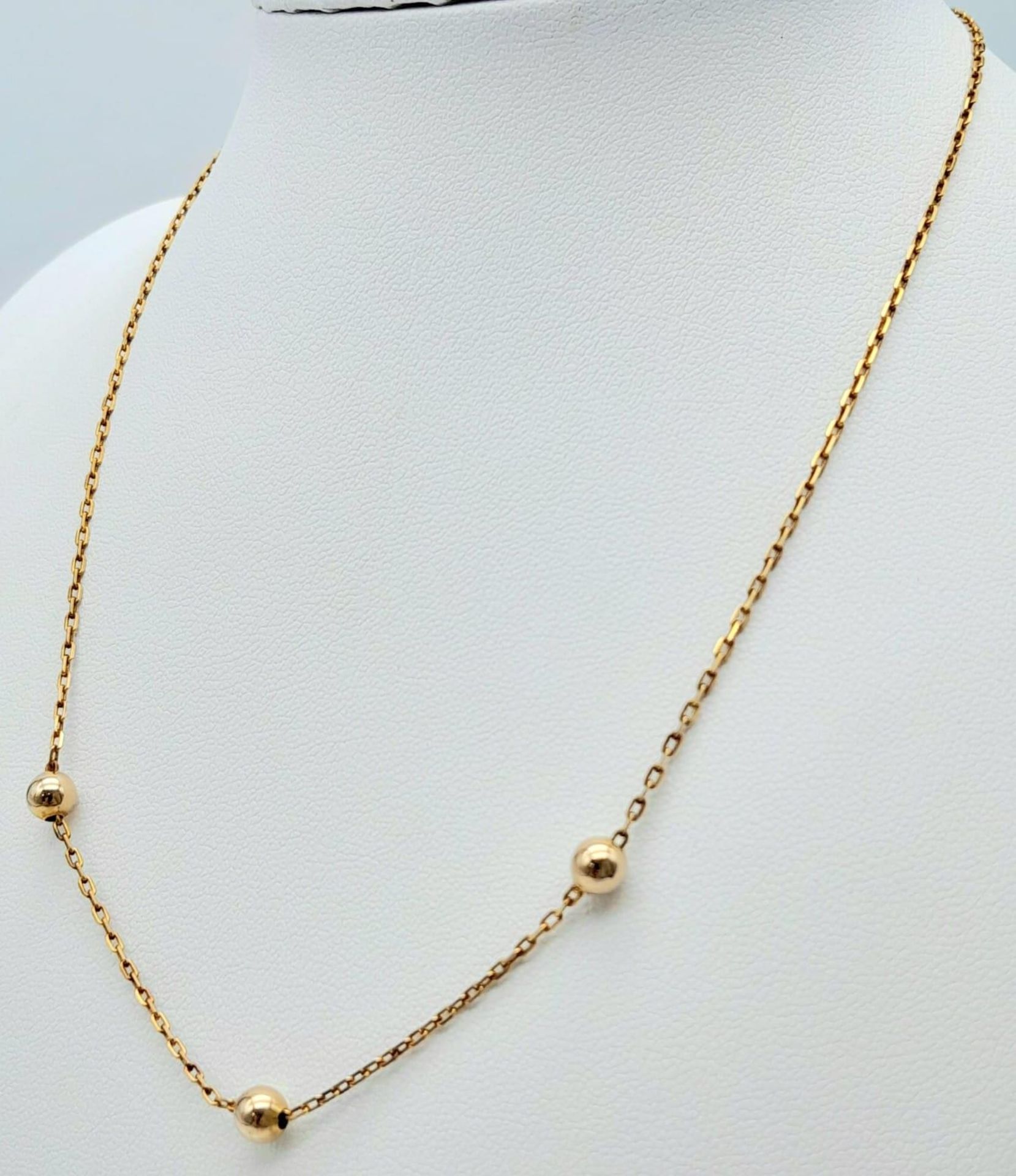 A very attractive, 9 K yellow gold chain necklace with golden balls and a pair of matching earrings. - Bild 3 aus 6