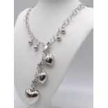 A sterling silver, necklace loaded with hearts. Total weight: 38.8 g. Perfect as a St valentine's