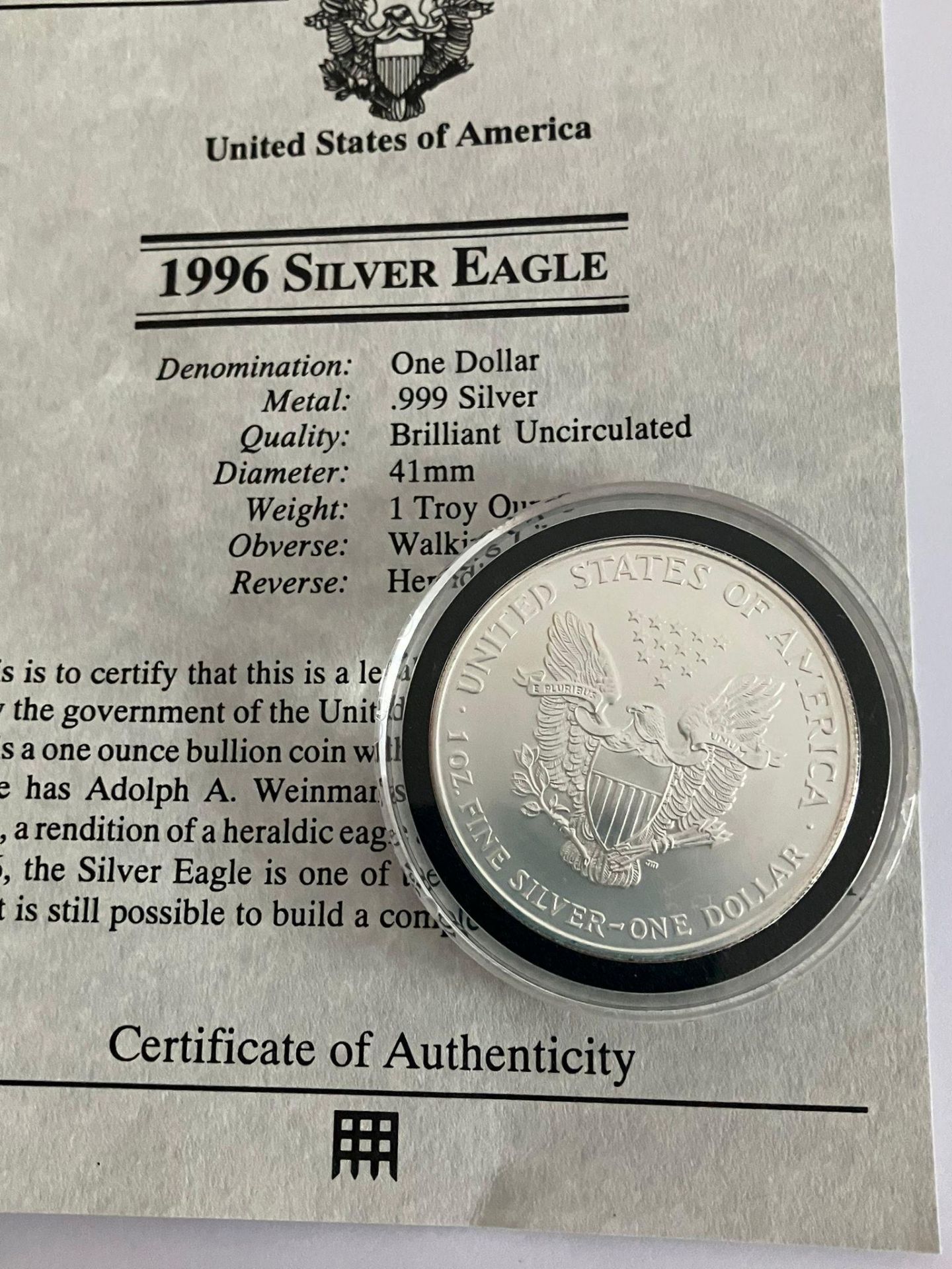 United States PURE SILVER DOLLAR. 1996 Silver Eagle/Walking Lady. Condition new and uncirculated.