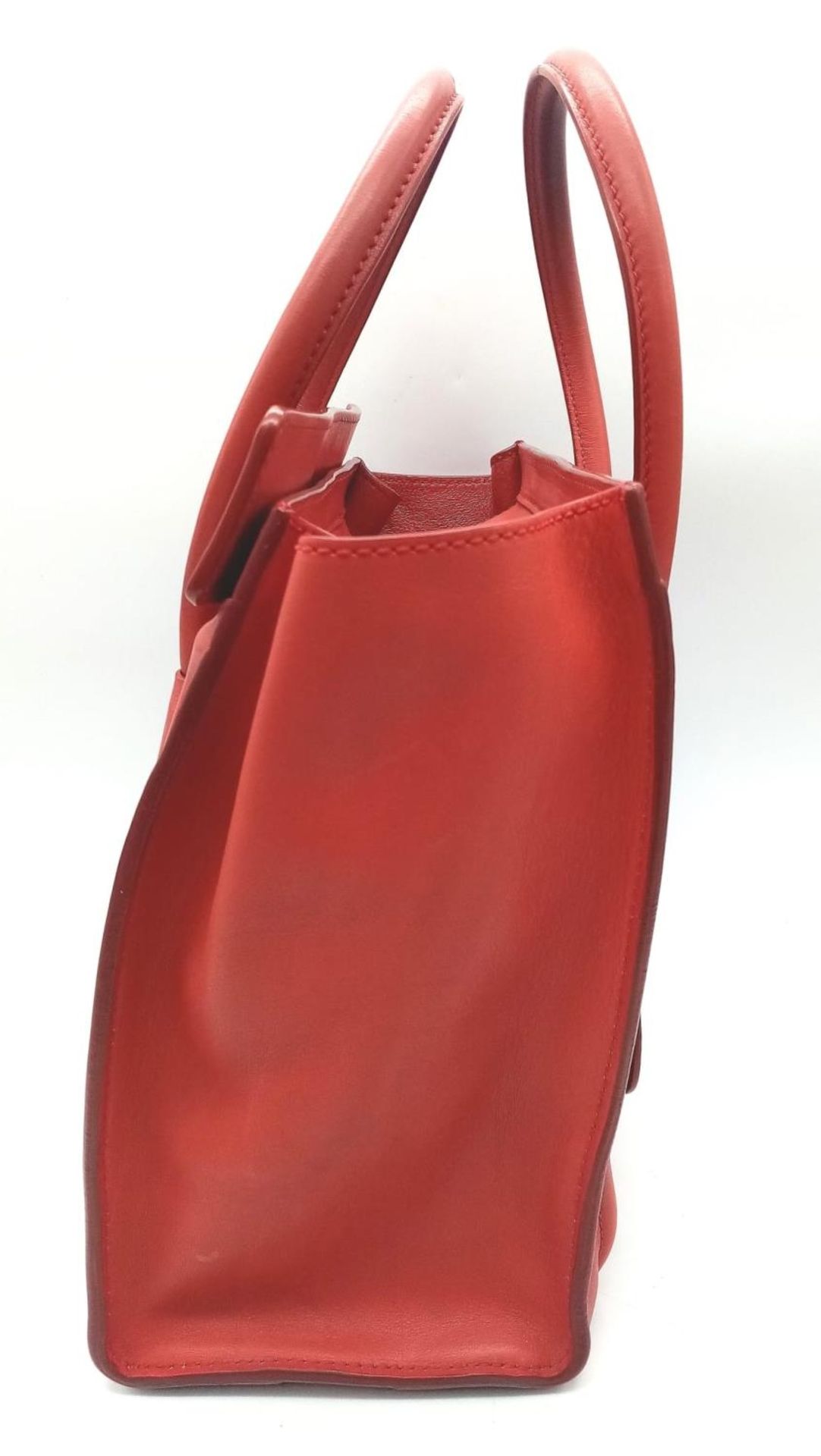 A Celine Coral Luggage Bag. Leather exterior with two rolled leather handles, a zipped pocket to the - Image 3 of 12