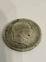 1817 GEORGE III SILVER SHILLING. Worn/fair condition. Dirty. Please see pictures.