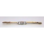 An 18k yellow gold diamond set tie pin with safety catch. 3.6g (dia:.30ct)