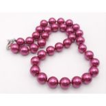 A Metallic Burgundy South Sea Pearl Shell Bead Necklace. 12mm beads. 44cm necklace length.