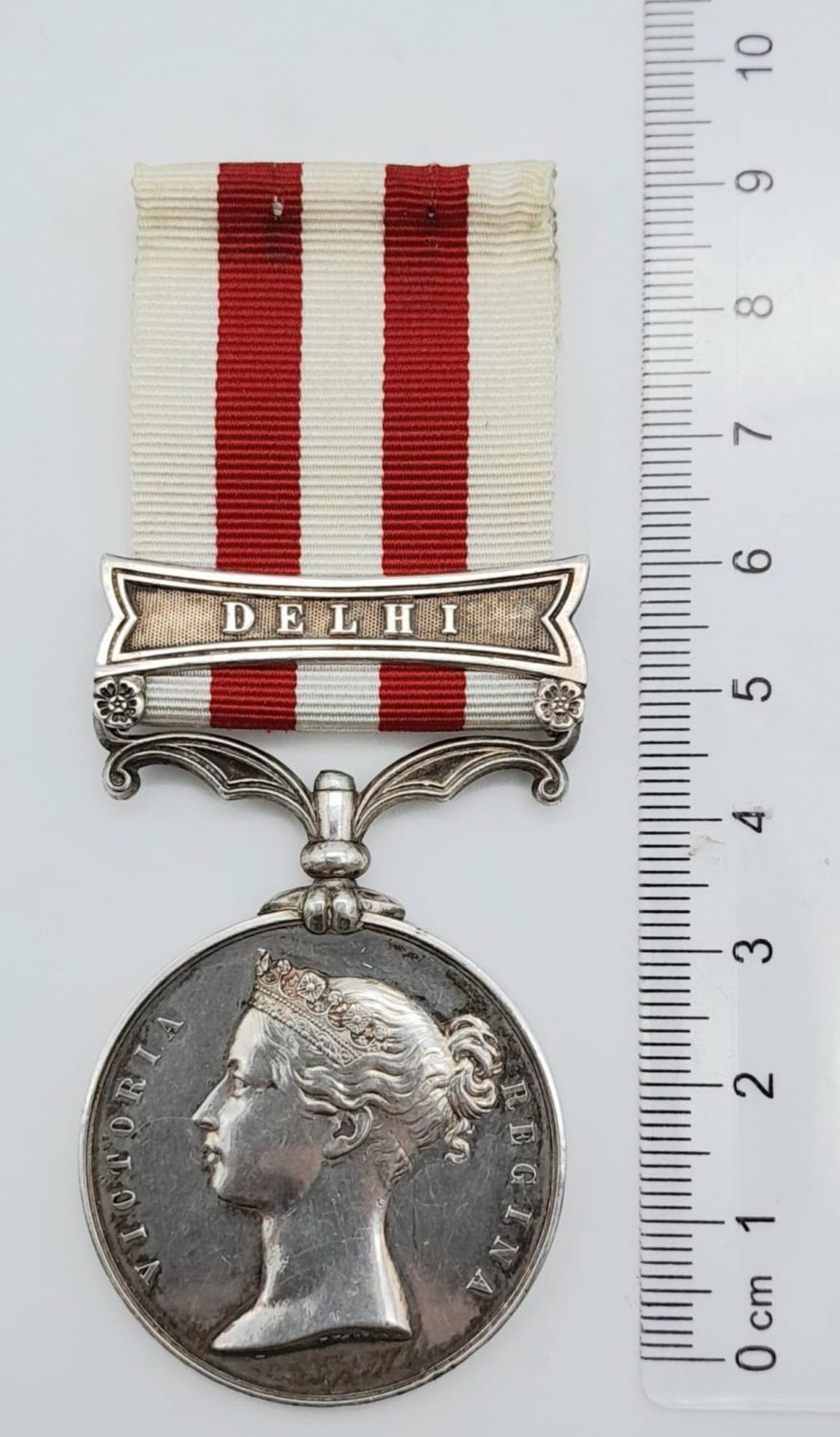 An Indian Mutiny Medal 1857-1858, with clasp ‘DELHI’; named to John Brown 1st Bn 8th Regt (renamed - Image 4 of 5