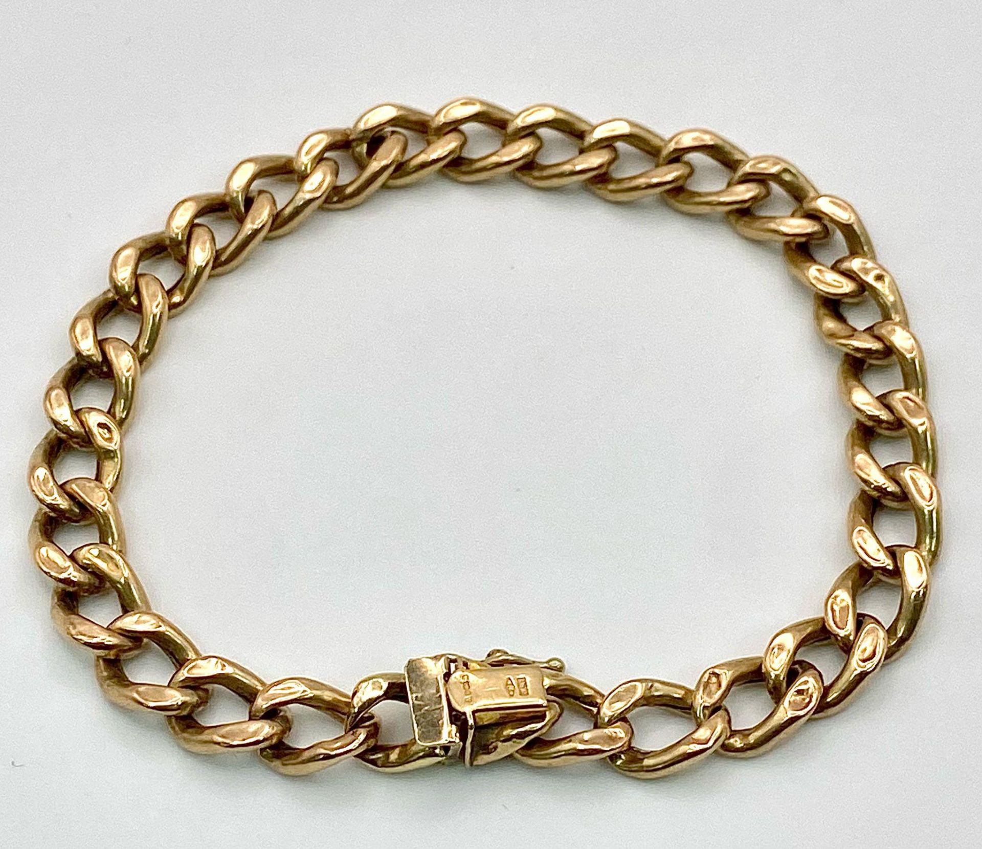 A 9k yellow gold curb bracelet - 23cm length. 11.3g - Bild 5 aus 7