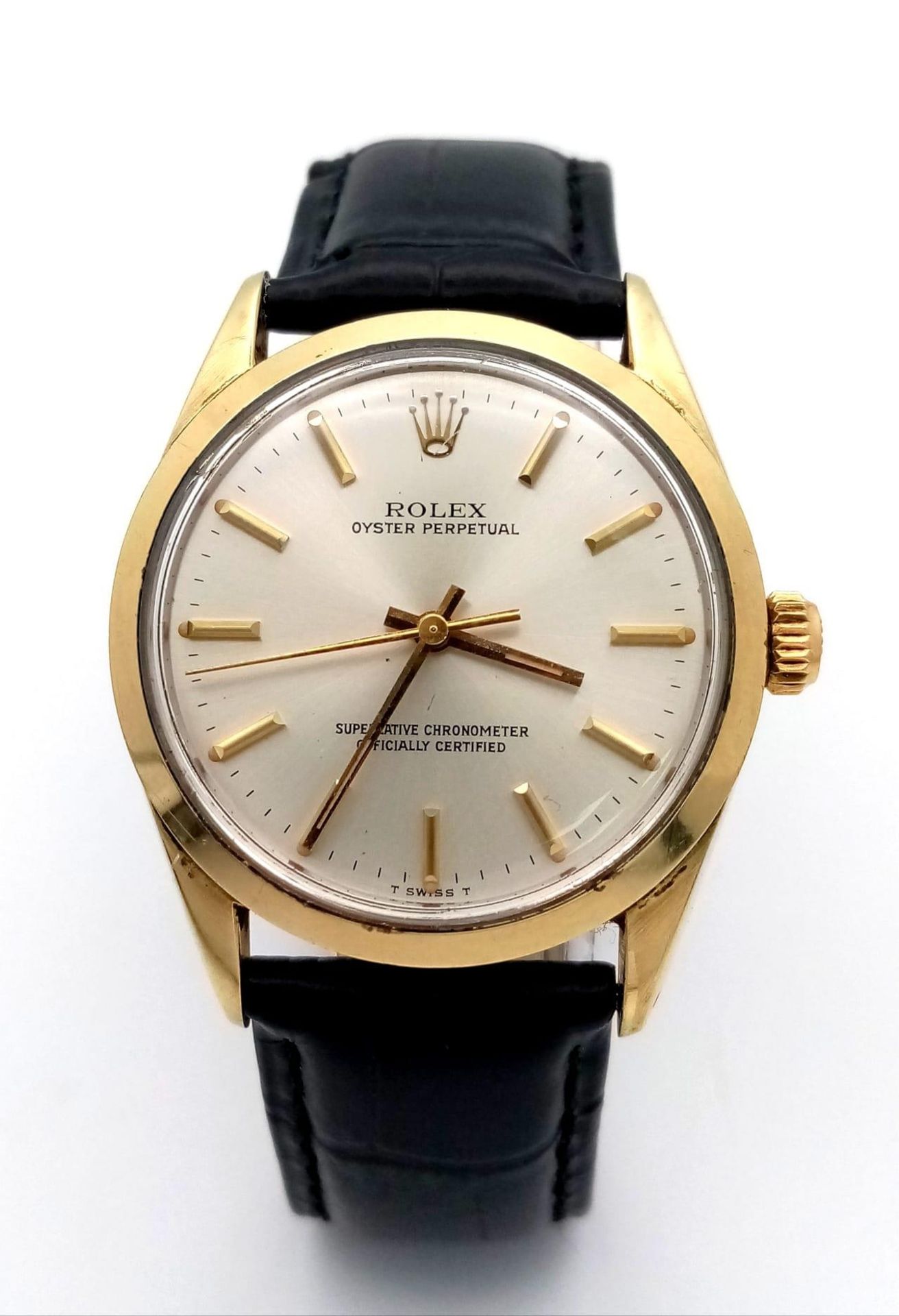 A VINTAGE ROLEX OYSTER PERPETUAL GENTS WATCH ON THE ORIGINAL ROLEX BLACK LEATHER STRAP ONLY WORN A