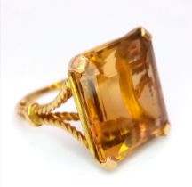 An 18k yellow gold vintage citrine ring (citrine:18mm X 16mm). 10.6g. Size K.