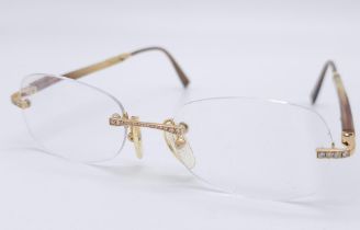 French made, magnifying glasses with 18kt Yellow Gold accents and set Diamonds. Come with a