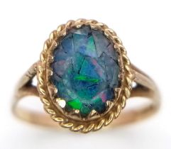 A 9K YELLOW GOLD OPAL SET RING. 1.4G. SIZE I 1/2