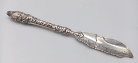 An antique sterling silver fish knife with flower motif. Full hallmarks Sheffield, 1856. Total