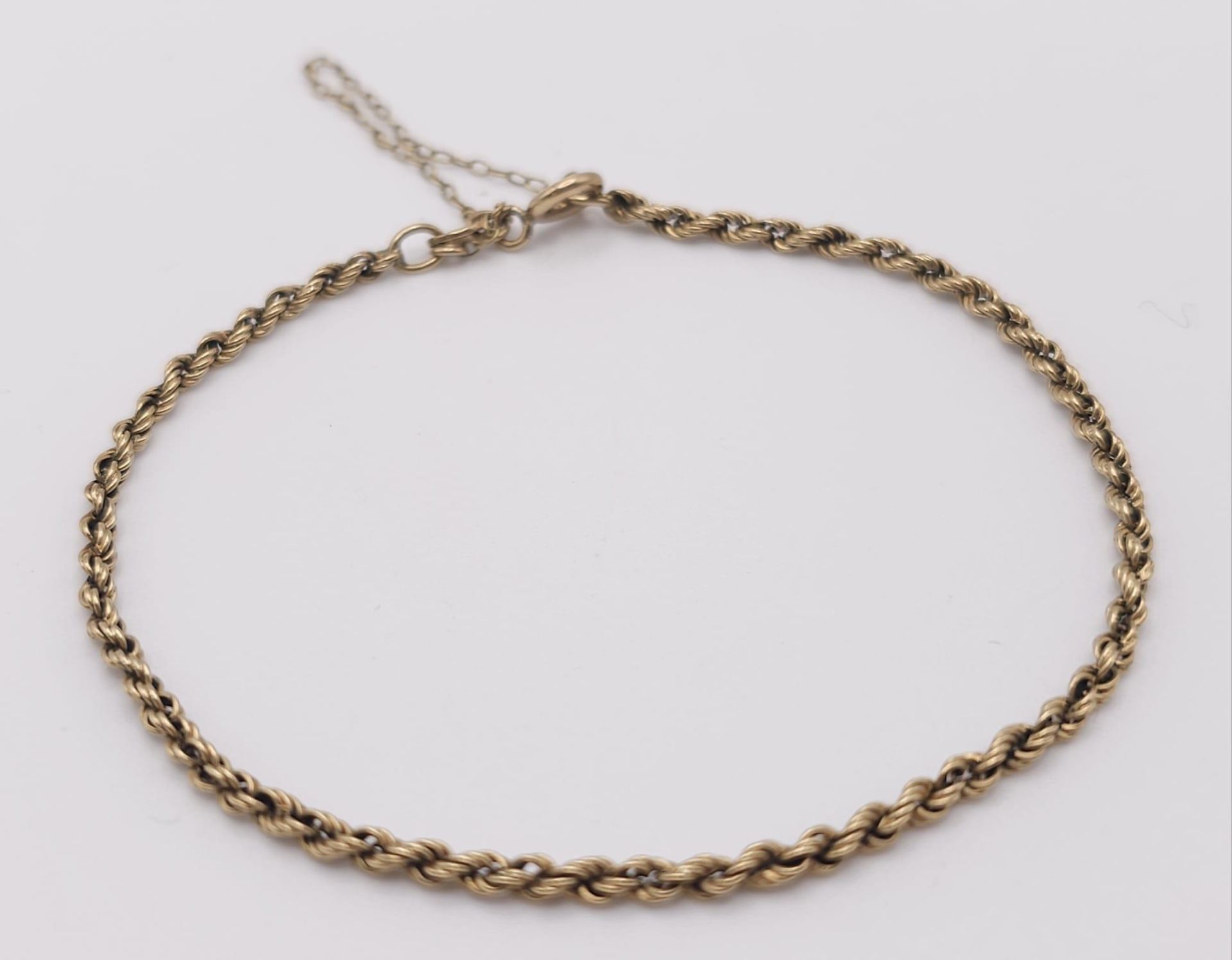A 9 K yellow gold rope chain necklace and bracelet set. Necklace length: 59 cm, bracelet length: - Bild 6 aus 9