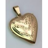 A 14K yellow gold heart locket, 4.5g . 38mm x 20mm ref: SH1303I-1