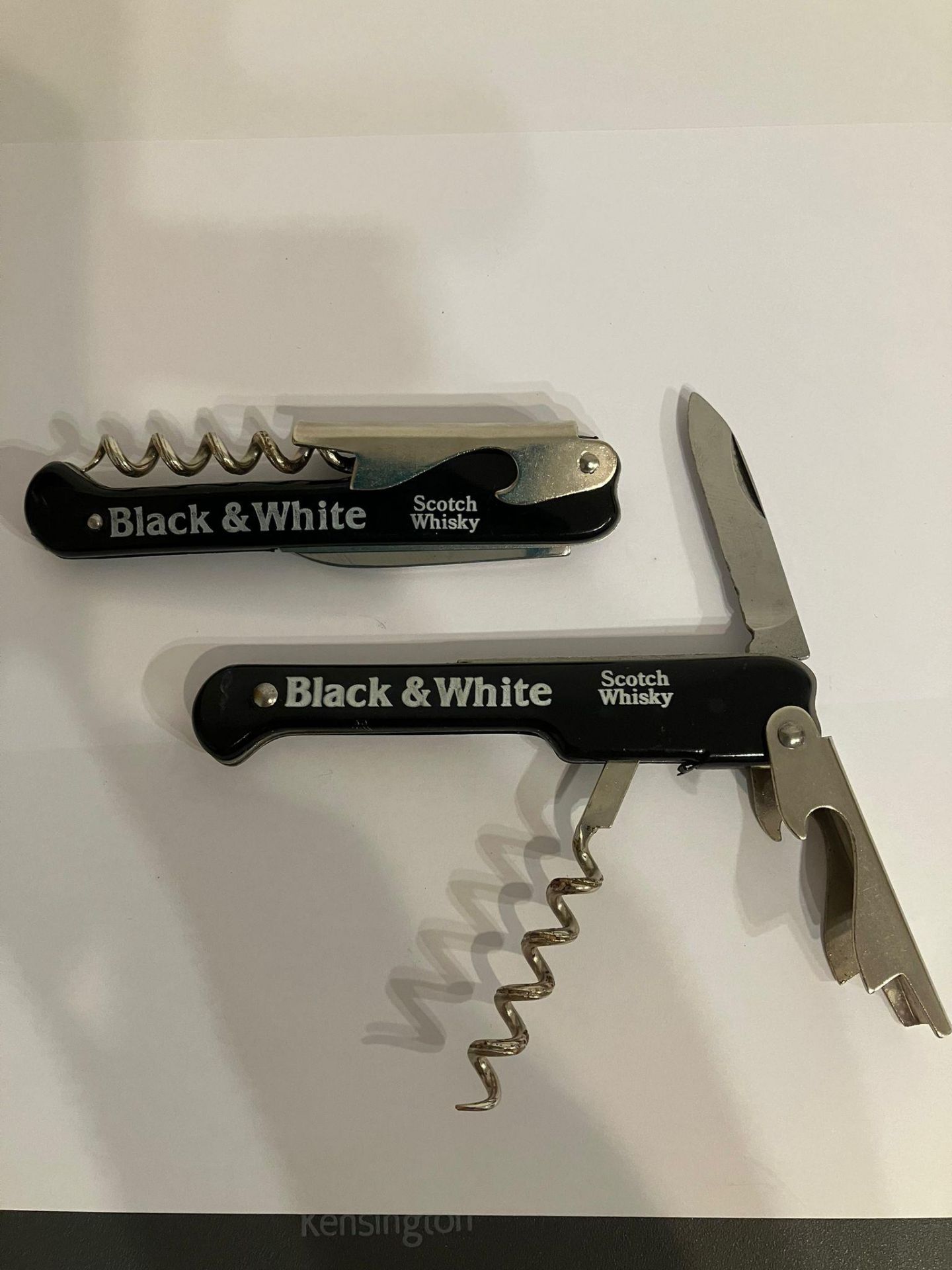 2 x Vintage ‘ Bar tenders friends’ Multi function knives. Complete with advertising logo for Black &