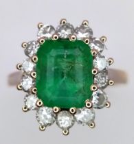 AN 18K WHITE GOLD DIAMOND & EMERALD CLUSTER RING. 0.50CT DIAMONDS & APPROX 2CT EMERALD. 3.6G. SIZE M