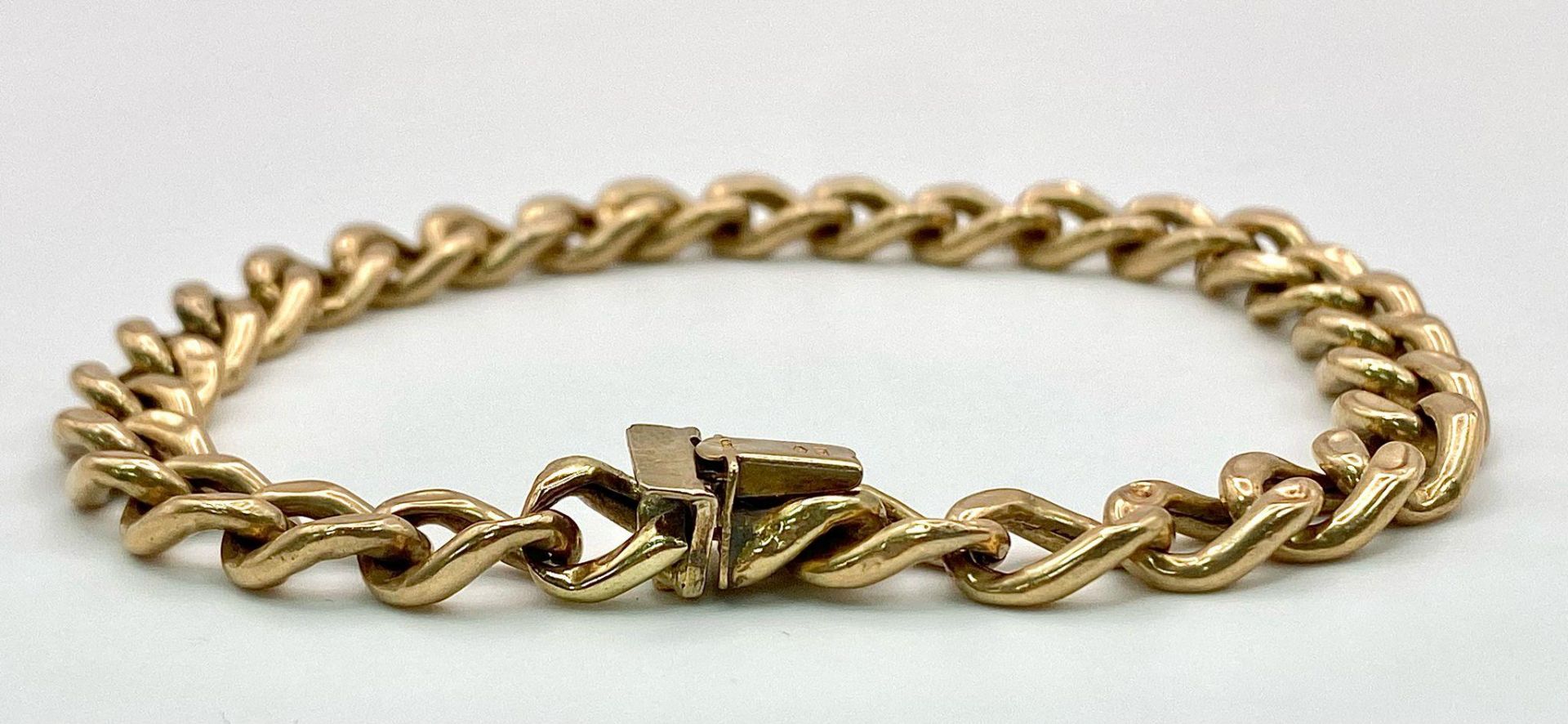 A 9k yellow gold curb bracelet - 23cm length. 11.3g - Bild 3 aus 7