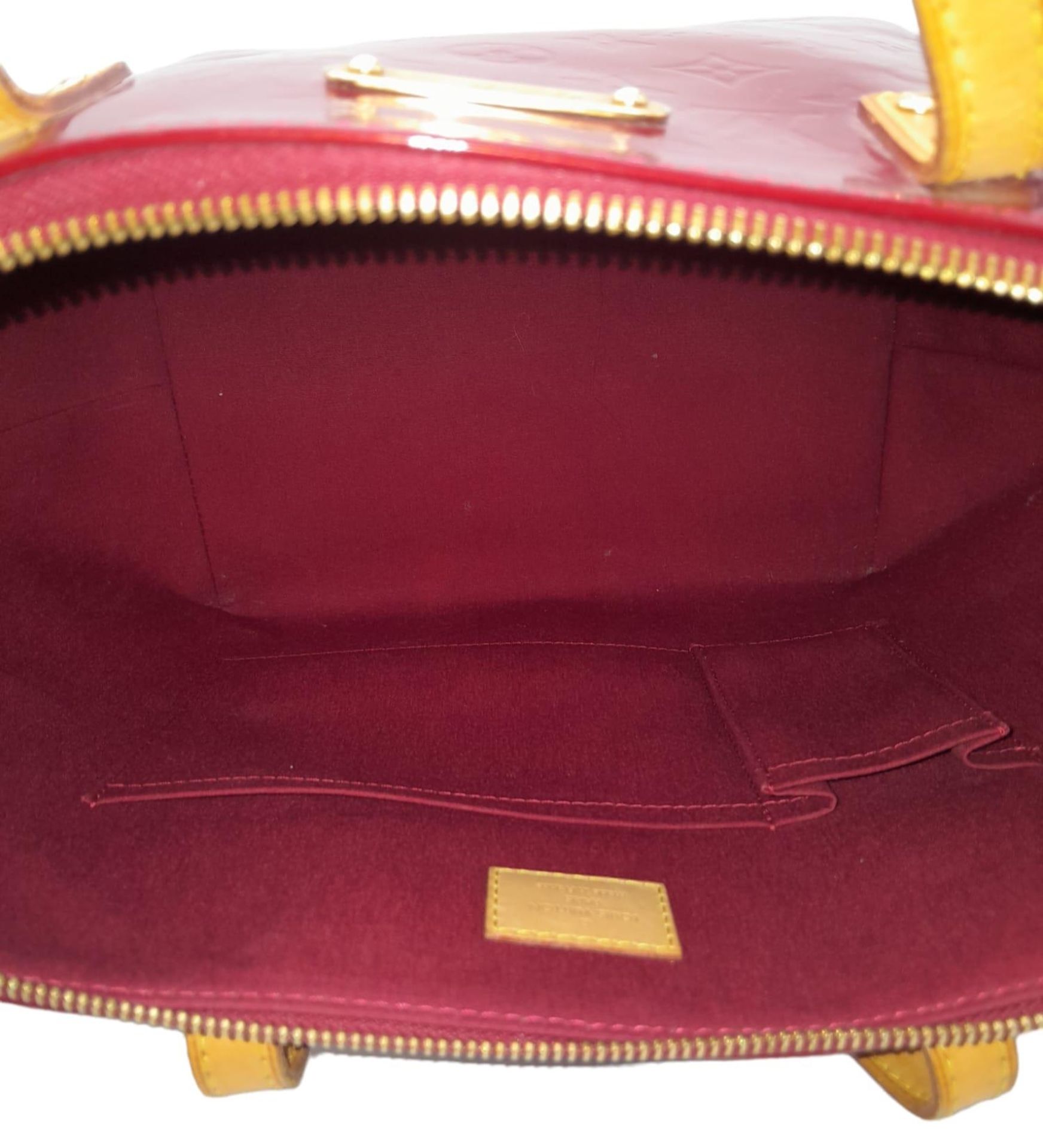 A Louis Vuitton Pomme D'Amour Monogram Vernis Bellevue PM Bag. Red patent leather exterior. Red - Image 4 of 8