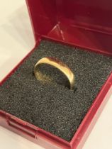 9 carat GOLD BAND/RING . Complete with ring box. 1.70 Grams. Size L 1/2 - M.