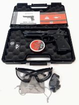A Beretta (Umarex) Co2 Air Pistol with Carry Case. Comes with ammo and safety googles. In good