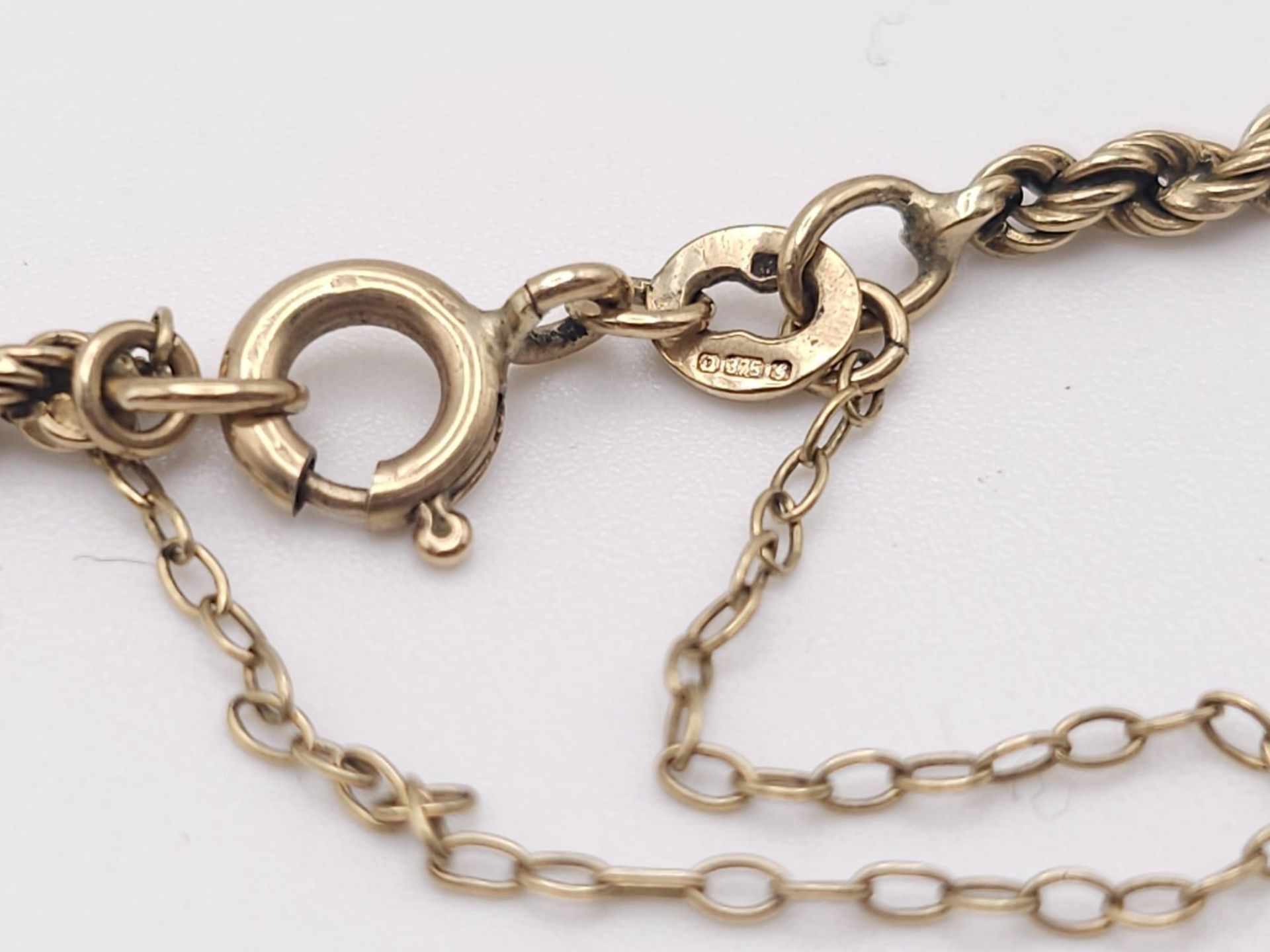 A 9 K yellow gold rope chain necklace and bracelet set. Necklace length: 59 cm, bracelet length: - Bild 8 aus 9