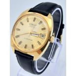A Vintage Camy Club Star Gents Watch. Black leather strap. Gilded case - 36mm. Gold tone dial with