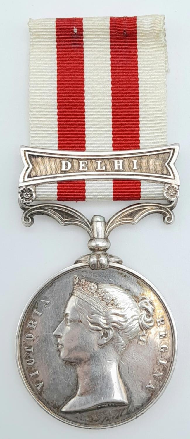 An Indian Mutiny Medal 1857-1858, with clasp ‘DELHI’; named to John Brown 1st Bn 8th Regt (renamed - Image 2 of 5