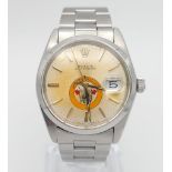 A ROLEX OYSTERDATE IN STAINLESS STEEL SPORTING THE EAGLE LOGO OF ABU DHABI .(DIAL NEEDS CLEANING)