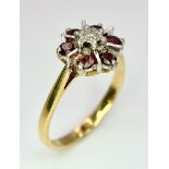 AN 18K YELLOW GOLD DIAMOND & GARNET CLUSTER RING. 3.4G. SIZE L.