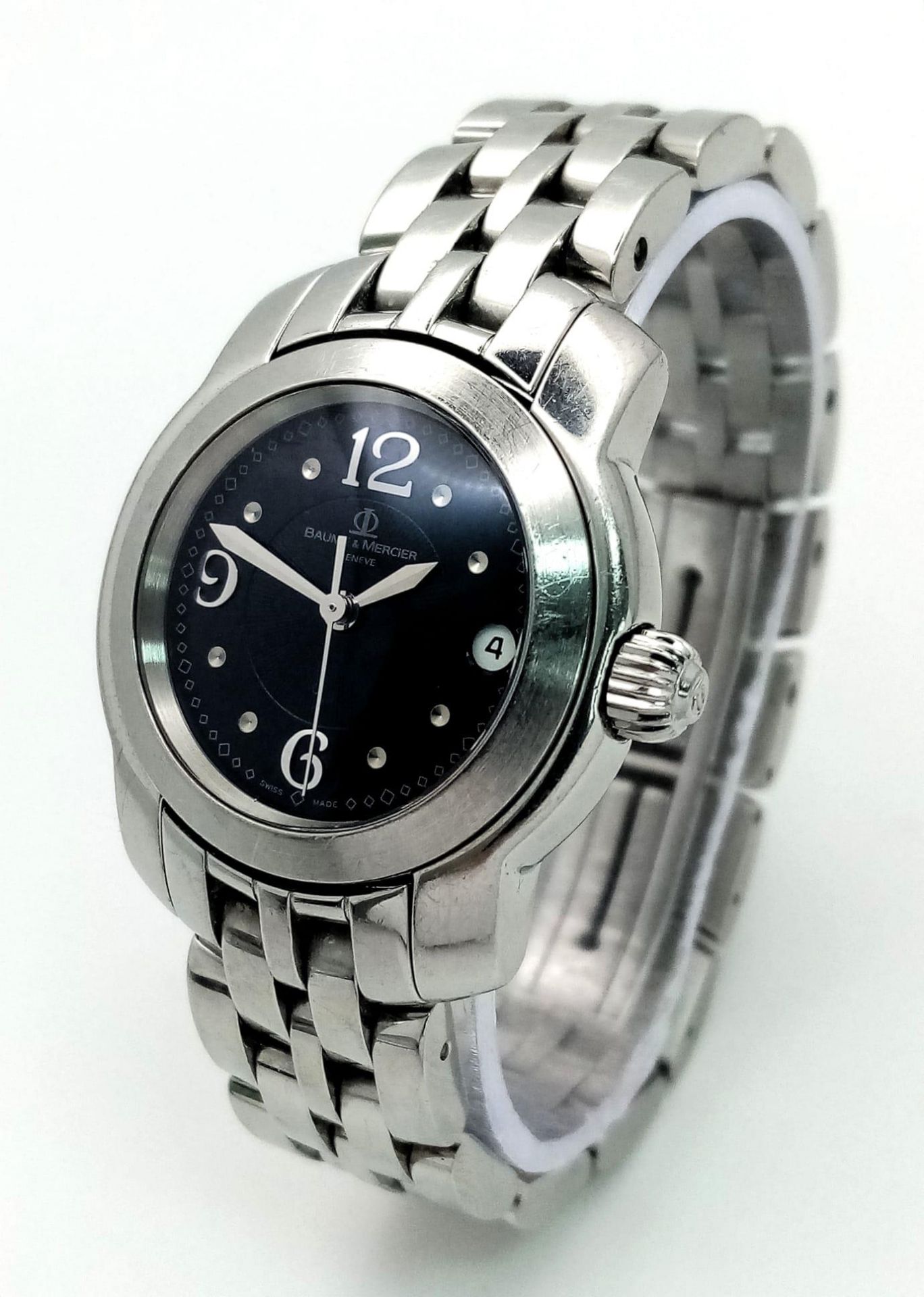 A BAUME AND MERCIER LADIES STAINLESS STEEL WRIST WATCH WITH BLACK DIAL , DATE BOX , AUTOMATIC