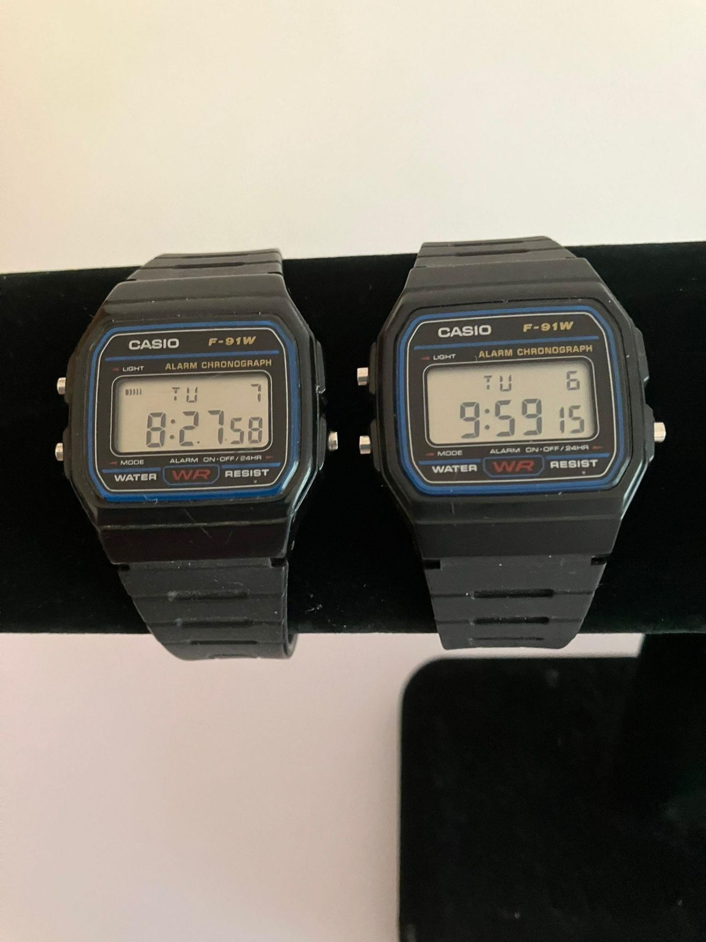 2 x CASIO DIGITAL f 91W Wristwatches. Water resistant with rubber diver straps. Full working order.