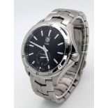 A Tag Heuer Link Calibre 6 Automatic Watch. Stainless steel bracelet and case - 41mm. Black dial