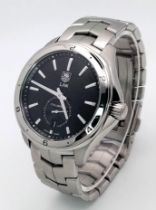 A Tag Heuer Link Calibre 6 Automatic Watch. Stainless steel bracelet and case - 41mm. Black dial