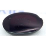 A 11.36ct Natural Rhodolite Garnet, in the Oval Cabochon shape. Comes with the AIG Milan