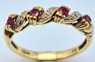 A 9K YELLOW GOLD DIAMOND & RUBY RING, IN THE SWIRL DESIGN 2.1G SIZE M A/S 2010