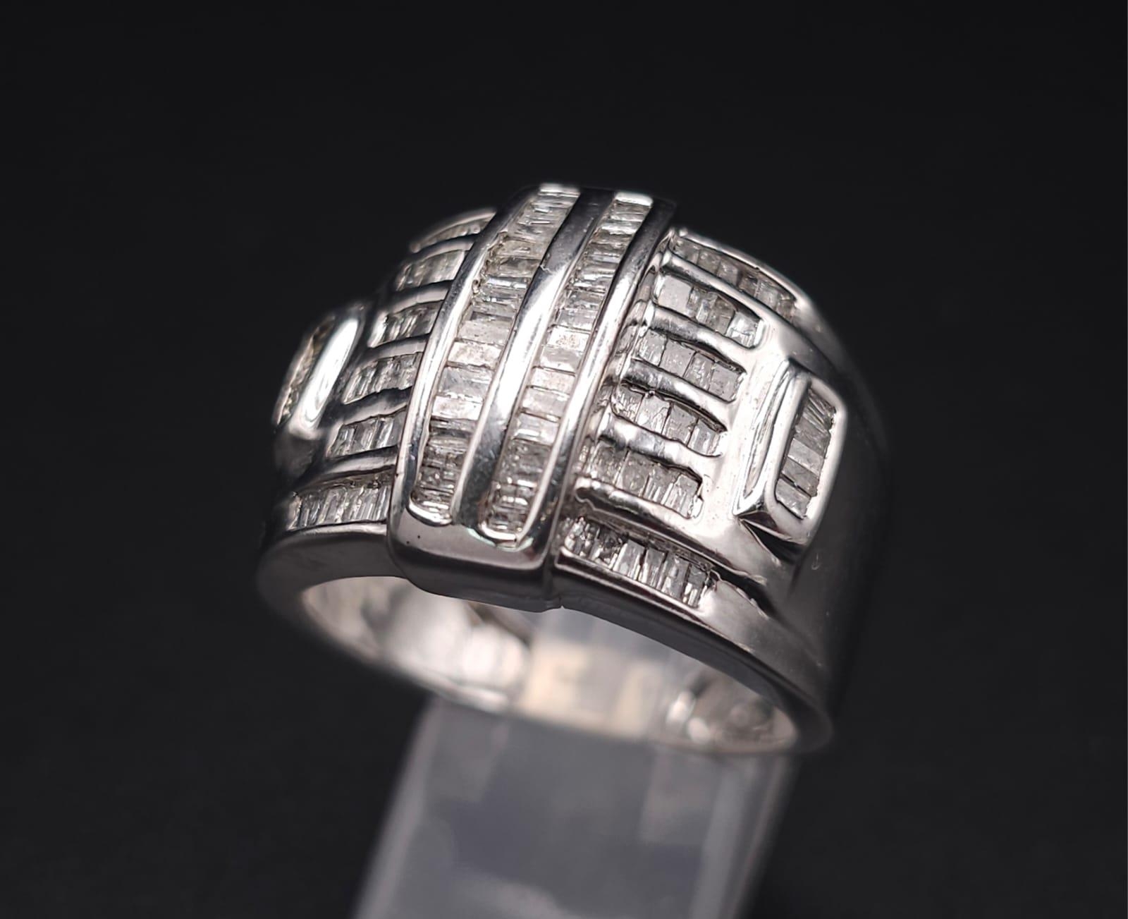 A 10K White Gold Baguette Diamond Cluster Ring. Size V. 1ctw. 7.4g total weight. - Image 2 of 9