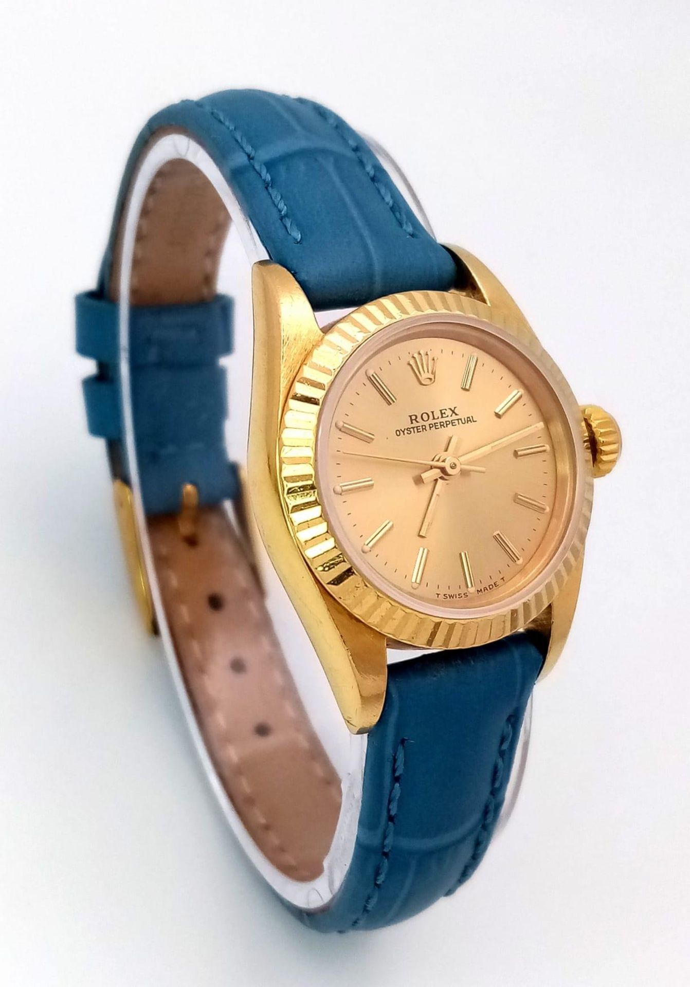 An 18k Gold Rolex Oyster Perpetual Ladies Watch. Blue leather strap. 18k gold case - 25mm. Gold tone - Image 2 of 10