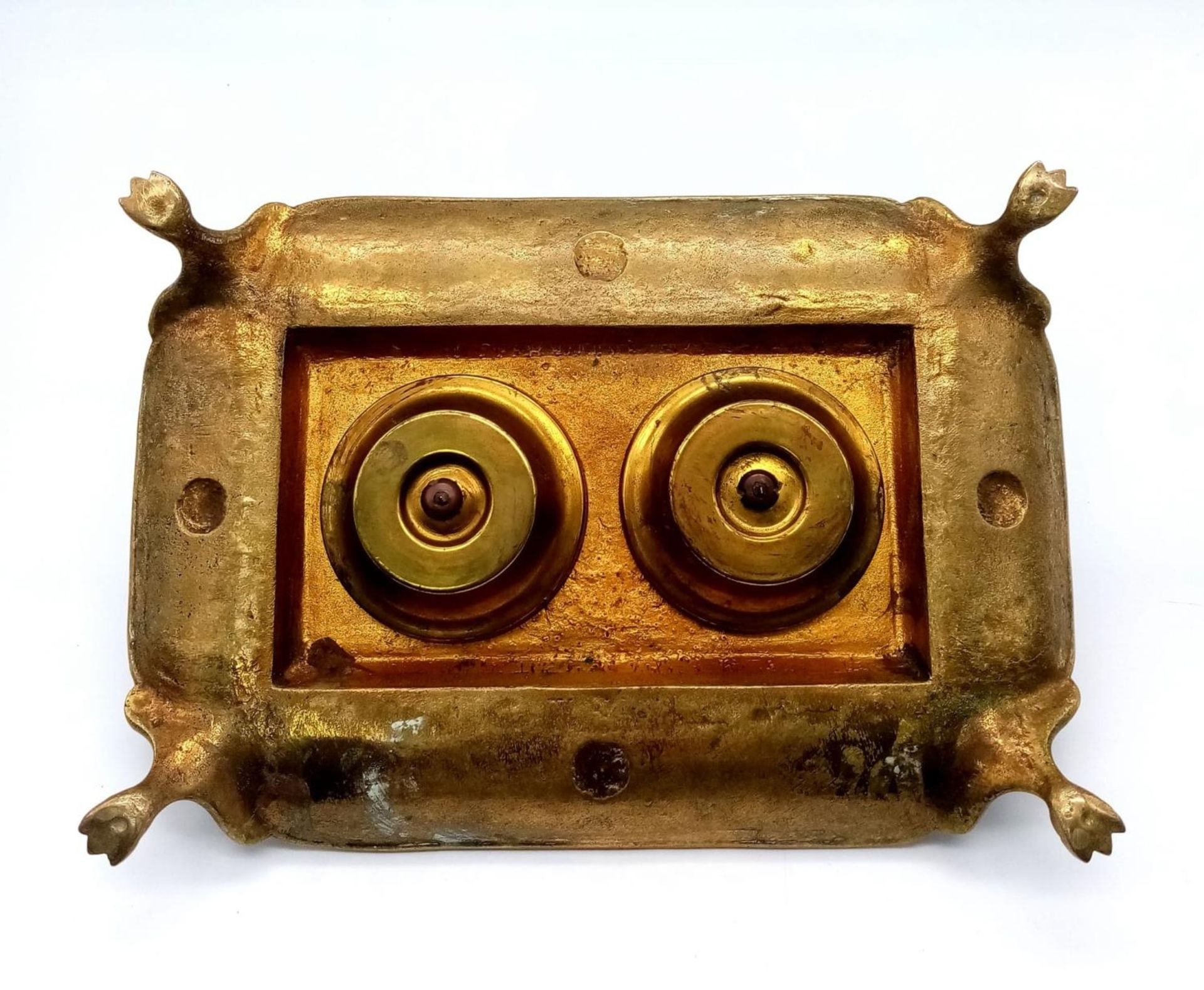 An Antique Brass (Possibly French) Double Inkwell. Ornate regal scroll decoration throughout with - Image 4 of 4