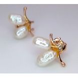 A Pair of 18K Yellow Gold Rice Pearl Earrings. 1.21g total weight. Ref: 15689